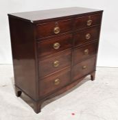 20th century mahogany cupboard, the lift-top above two cupboard doors, on bracket feet, 96cm x