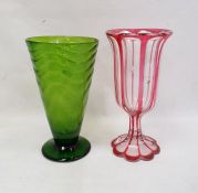 Green glass vase with conical wave-moulded body and circular spreading foot, 30cm high and a pink