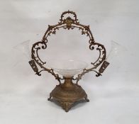 Silver-coloured metal and clear glass table epergne, the circular bowl to centre flanked by a pair
