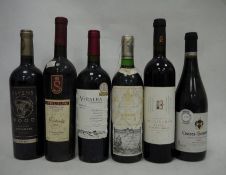 One bottle Vinalba Malbec 2012, one bottle Marques de Riscal Rioja 2000, one bottle Ravens Wood