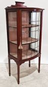 Early 20th century mahogany and boxwood strung bowfront display cabinet with leaded glazed doors