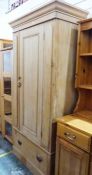 Vintage pine single-door wardrobe, the moulded cornice above the single door, single drawer under,