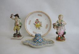 18th century pearlware figure of gentleman wearing green cloak and holding flaming torch and mirror,