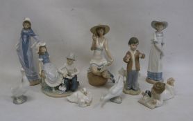 Quantity of Nao figures to include boy bandaging girl's foot, Edwardian-style lady, girl seated on