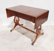 20th century  yew-effect sofa table on lyre end supports, ogee reeded feet, brass paw caps and