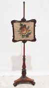 19th century rosewood needlework polescreen with floral spray, on baluster turned and carved
