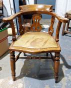 Elm captain's type chair with carved and pierced backsplat, serpentine fronted seat and turned