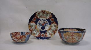 Imari porcelain plaque, circular and ribbed, 52cm diameter, an Imari porcelain bowl, fluted and with