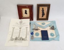 Two black and white silhouette portraits and quantity masonic regalia in case