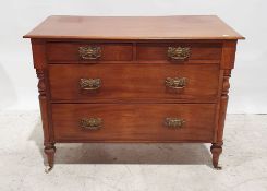 Early 20th century chest of two short over two long drawers, all raised on china castors, 101cm x