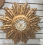20th century Smiths sunburst clock, in gold coloured moulded frame, 45 cm approx