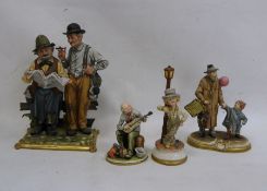 Capodimonte figure group, two tramps reading newspaper, another of man with child and balloon,