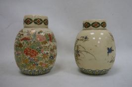 Pair Japanese earthenware vases and covers, ovoid, decorated with birds and floral sprays,