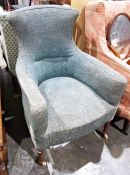 Early 20th century armchair on turned supports to castors