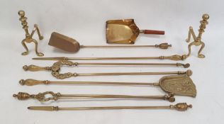 Quantity brass fireside implements including tongs, pair brass fire dogs and a shovel