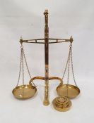 Pair of W&T Avery Limited brass pan balance scales, patent 24269-06 and four weights