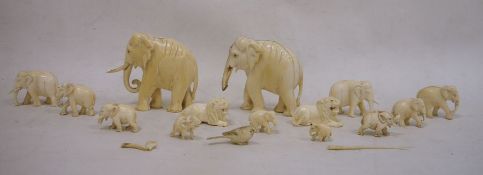Collection of carved ivory elephants, lions, etc, graduated, largest 8.5cm high (1 box)