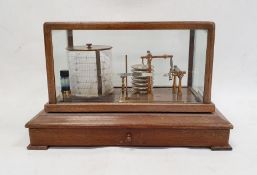 Stained wood and glazed cased barograph with single shelf, on sledge feet