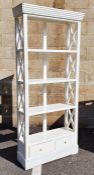 20th century white painted shelving unit with two drawers under, on plinth base, 90cm x 200cm