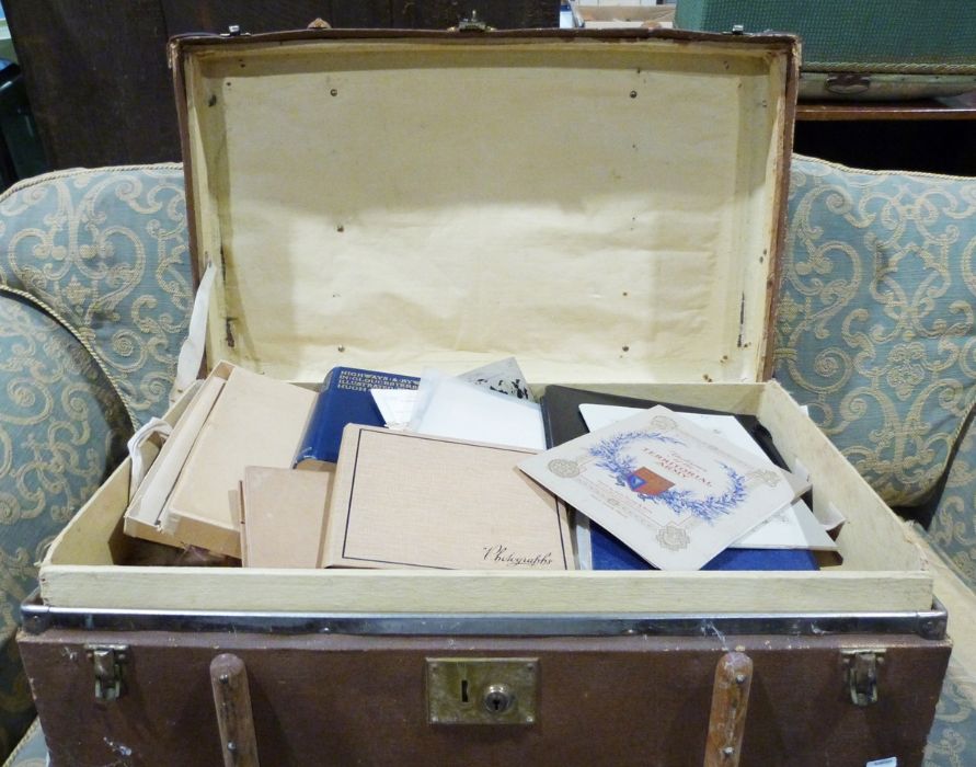 Wooden and canvas travel trunk containing books of cigarette cards, stamp albums, photograph albums,