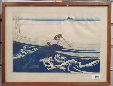 Japanese woodblock colour print depicting fishermen with Mount Fuji in the background together