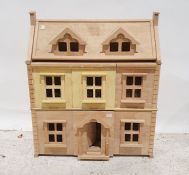 Wooden doll's houseCondition ReportApprox. Dimensions: W 64cm x H 74cm x D 34cm