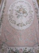 Large modern machine needlepoint carpet/rug, mainly pinks, pale blues, patterned with roses,