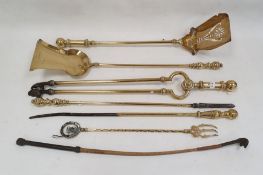 Copper warming pan, a four-piece set of brass firetools and various other items, brass fire guard