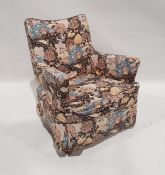 Armchair in loose fitting animal print covers  Condition ReportWhite fabric under the cover has some