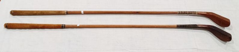 Pair of replica golf clubs stamped 'McEwan and made in Scotland Replica' (2)