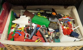 A large quantity of loose Lego, one basket, a blue bucket and a box