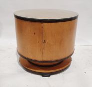 In the manner of Ray Hille, circa 1930, Art Deco cocktail cabinet of circular form, veneered in
