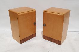 Pair of 1930 Art Deco bedside cabinets veneered in bird's eye maple, the hinged door enclosing