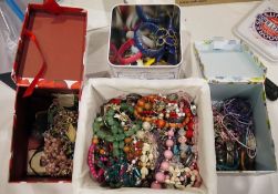 Large quantity of costume jewellery including bead necklaces, plastic bangles etc. (4 boxes)