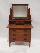 Early 20th century oak dressing chest, the mirrored superstructure above three drawers, on moulded