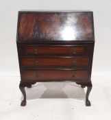 20th century bureau with three drawers, on cabriole legs to claw and ball feet, 73.5cm x 99cm