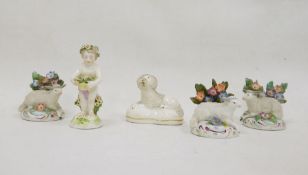 Three 19th century Samson-style figures of lambs, a Derby-style figure of putto and a
