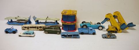 Quantity of playworn diecast model cars and buildings to include 'Dinky Supertoys TV extending