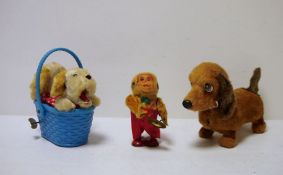 Japanese clockwork automaton of monkey with cymbals, Japanese clockwork automaton of two dogs in a