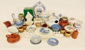 Carnival glass bowl, a glass decanter with etched grape and vine decoration and further glassware