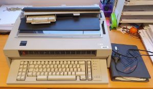 IBM 6747 electric typewriter with instruction manual and power lead