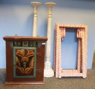 A painted cupboard, a pair of of large wooden floor standing candlesticks and two luggage racks