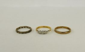 18ct gold and platinum three-stone diamond ring set three small diamonds in illusion setting, a