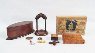 Carved wooden box on ebonised base, shaped as a teardrop, a carved timepiece holder, a vintage