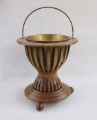 Georgian style mahogany and satinwood strung jardiniere of circular form with brass loop handle,