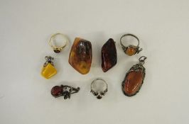 Gold and amber cabochon ring, amber brooches, pendant and rings