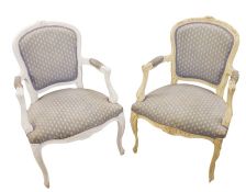 Two, possibly Swedish Gustavian-type armchairs with painted frames, carved top rails, upholstered