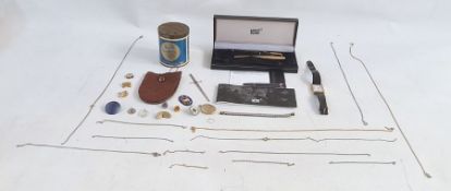 Mont Blanc box (no pen), a Parker pen with faux-tortoiseshell, a gold-plated Parker pen, a small tin