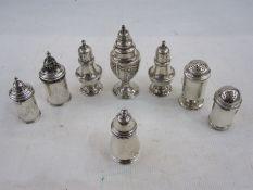 Eight assorted silver condiments, varying dates, 10oz