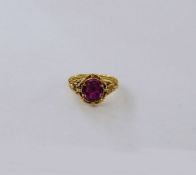 Antique gold-coloured metal and pink tourmaline-coloured stone ring with foliate shank Condition